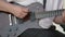 Guitarists hands playing song on electric guitar