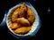 Gujiya,pedakiya,karanji,Kajjikayalu is a sweet deep-fried dumpling Shaped like a half-moon, made with suji or maida stuffed with