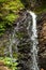 Guk Waterfall in Carpathian mountains in summer. Beautiful nature of Ukraine