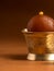 Gulab Jamun in copper antique bowl with spoon, Indian Dessert or Sweet Dish