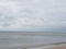 Gulf coast Florida beach dolphin overcast storm