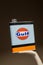 gulf motor oil can gas station logo brand orange and text sign blue of american