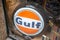 Gulf motor oil gas station logo brand orange and text sign blue of the international