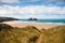 Gull or Carters`s Rocks, Holywell Bay near Newquay, Cornwall. Iconic twin islets with moody sky background