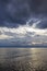 Gull flying over dark Adriatic sea