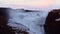 Gullfoss waterfall in Iceland, Cinematic beautiful majestic winter waterfall cover by snow and ice. Slow motion. Sunset sky
