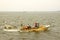 Gulls and pelicans mob crabbers checking their pots in North Car