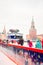 GUM ice rink on Red Square with colorful lights on snowy winter day in Moscow, Russia