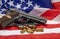 Gun and bullets , Semi automatic pistol handguns with ammunitions on an american flag background