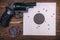 Gun and paper target. Shooting practice. Shooting range.