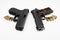 Guns and bullets , Semi automatic pistol handguns with ammunitions on white background