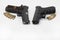 Guns and bullets , Semi automatic pistol handguns with ammunitions on white isolated background