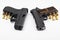 Guns and bullets , Semi automatic pistol handguns with ammunitions on white isolated background