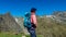 Gurglitzen - Hiker woman with panoramic view of unique mountain ridge Boese Nase in Ankogel Group, Carinthia, Austria