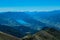 Gurglitzen - Idyllic hiking trail on alpine meadow with scenic view of lake Millstatt seen from mountain peak Boese Nase