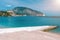 Gurzuf resort with pebble beach in the foreground and Ayu-Dag mountain in the background, Crimea. Empty beach in the Yalta resort