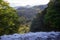 Gushing out a lot of water down a steep vertical cliff at Yudaki Falls in Nikko,Tochigi,Japan.