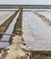 Gutter in salt ponds that make raw salt or pile from sea water i