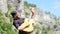 A guy with a beard in a black shirt and sunglasses pretends to play a smoky acoustic guitar. Strange funny video for a music video