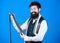 Guy with beard choosing necktie. Perfect necktie. For formal occasions choose solid colored tie that is darker than your