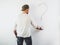 Guy erasing a question mark on a white wall