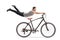 Guy flying and holding onto a bicycle