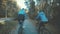 He guy and the girl biking in the autumn forest in sunny weather