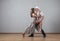 Guy and girl in dance movement .