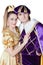 Guy and girl dressup as Prince and Princess isolated on a white