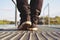 Guy goes in sneakers the pier