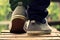 Guy goes in sneakers on the pier