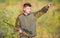 Guy hunting nature environment. Bearded hunter rifle nature background. Hunting hobby concept. Hunting season