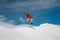 Guy is jumping on a blue snowboard from a snowy mountain