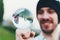 The guy learns to juggle a transparent ball