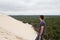 Guy looking people going down the Pilat dune