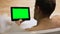 Guy reading news on green-screen tablet resting in bathtub at home, relax