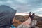 Guy resting in the mountains.Mountaineer observing the landscape