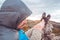 Guy resting in the mountains.Mountaineer observing the landscape