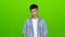 Guy is sad, he has a sorrowful look, he is upset. Green Screen