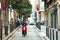 Guy smiling with motorcycle in Barcelona