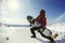 A guy snowboarder enjoys a holiday at the ski resort