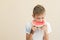 Guy teen eats ripe watermelon