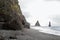 Guy tourist sits on top of a mountain in Iceland, the concept of