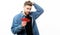 Guy well groomed hold heart white background. Romantic macho. Man with beard celebrate valentines day. Love and romantic