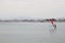 Guy windsurfing near the coast in Spain