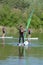guy windsurfs on lake