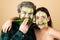 Guy with woman make mask for skin together, funny couple of lovers, isolated photo emotional. Funny couple with facial