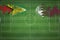 Guyana vs Qatar Soccer Match, national colors, national flags, soccer field, football game, Copy space