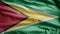 Guyanese flag waving in the wind. Close up of Guyana banner blowing soft silk