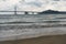 Gwangalli Beach and Gwangan Bridge in Busan during winter morning cloudy day at Suyeong-gu , Busan South Korea : 9 February 2023